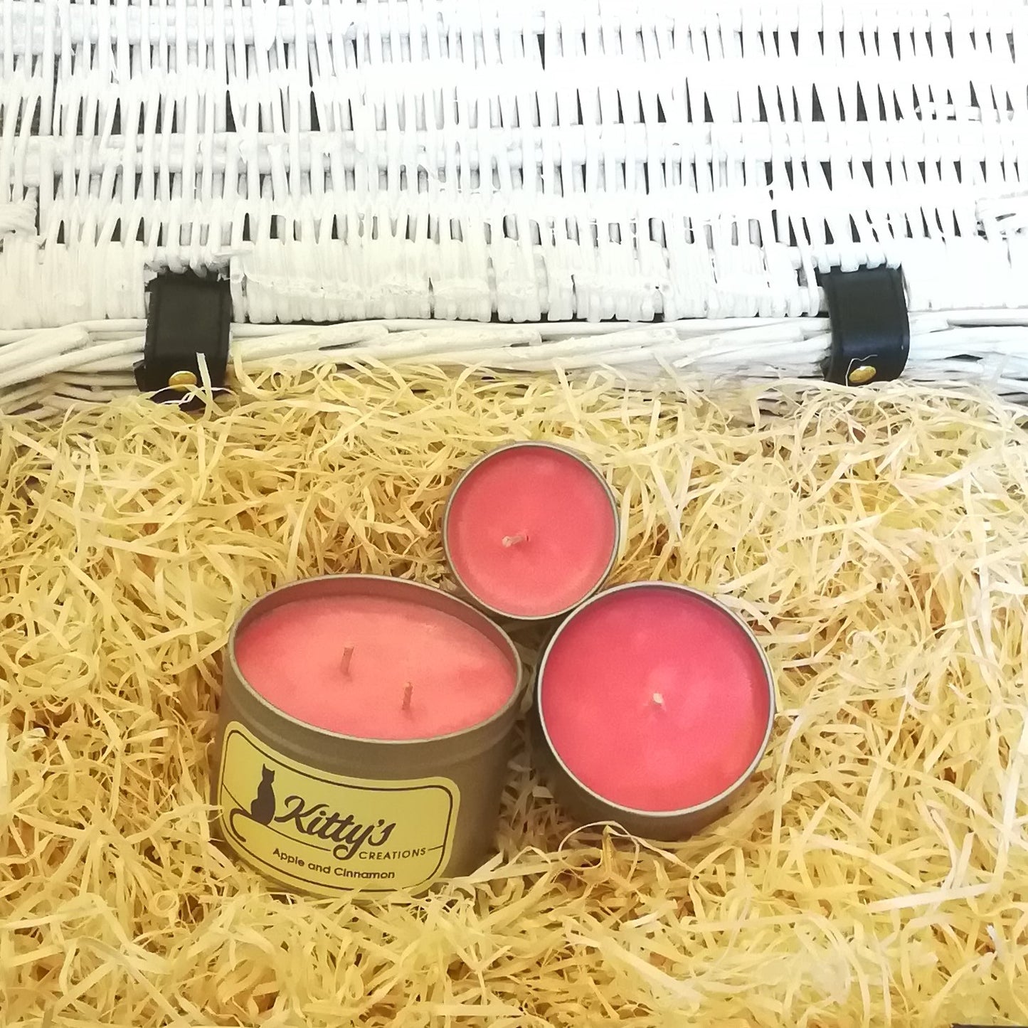 Three hand poured candles filled with apple and cinnamon fragranced soy wax, contained in travel tins with clear see through lids ready for you to take on your next adventure whether for work or pleasure. 